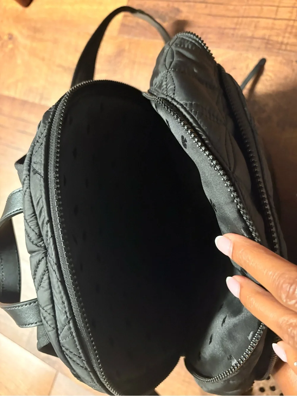 kate spade Black Quilted Mini Backpack with Gold Logo